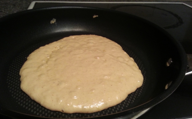 Cooking the pancake like a pro.